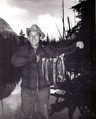 Original ca 1950 Photo Bing Crosby Happy in Wilderness w String of Fish.jpg